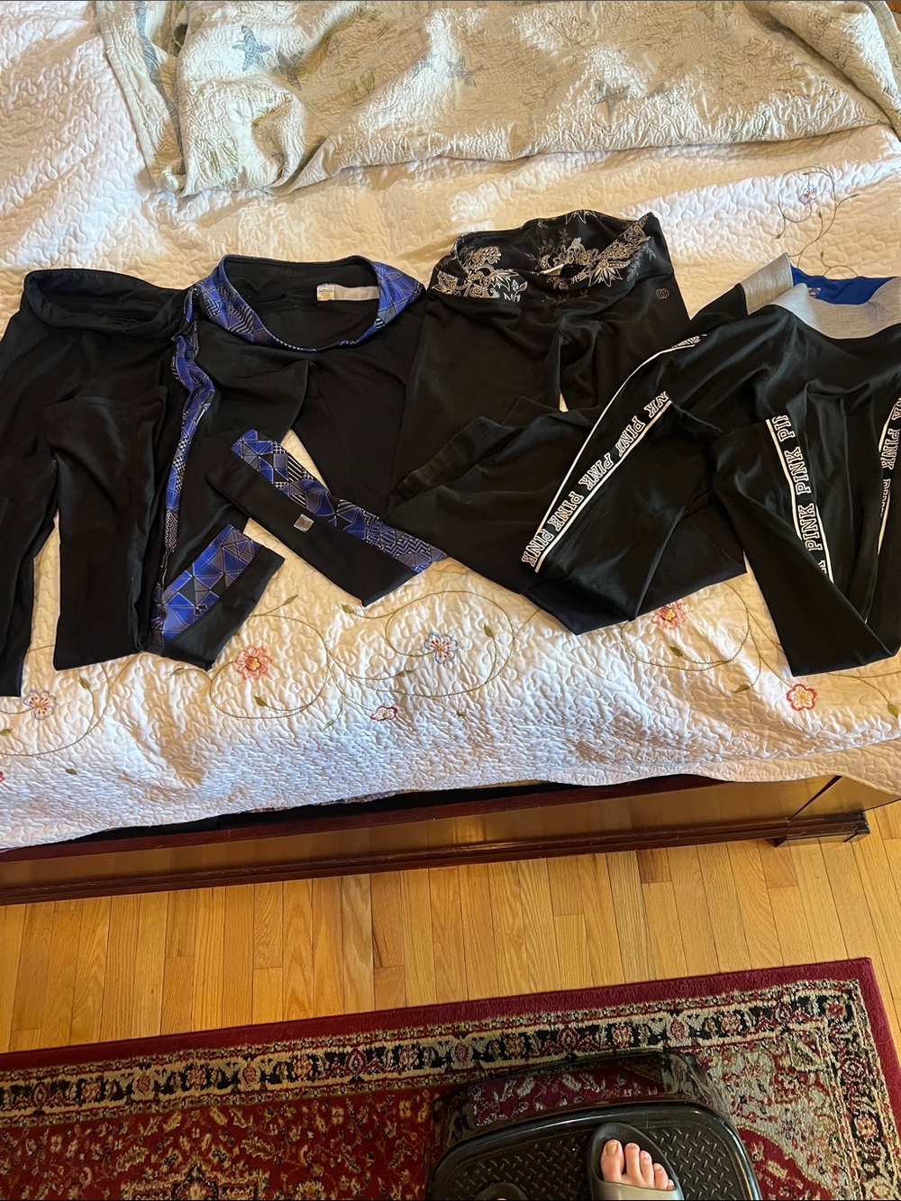 4 Women Athletic Leggings. Different conditions and different brands.